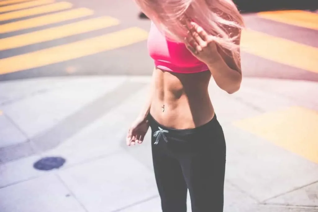 Woman with toned stomach after LA-EMS Body Sculpting Treatment Enfield Highway